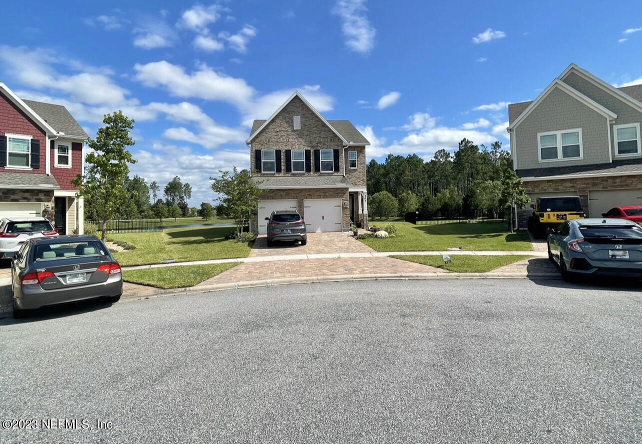 207 Silver Creek Place St. Augustine, FL 32095 - Photo 4 of 32 a view of street with parked cars
