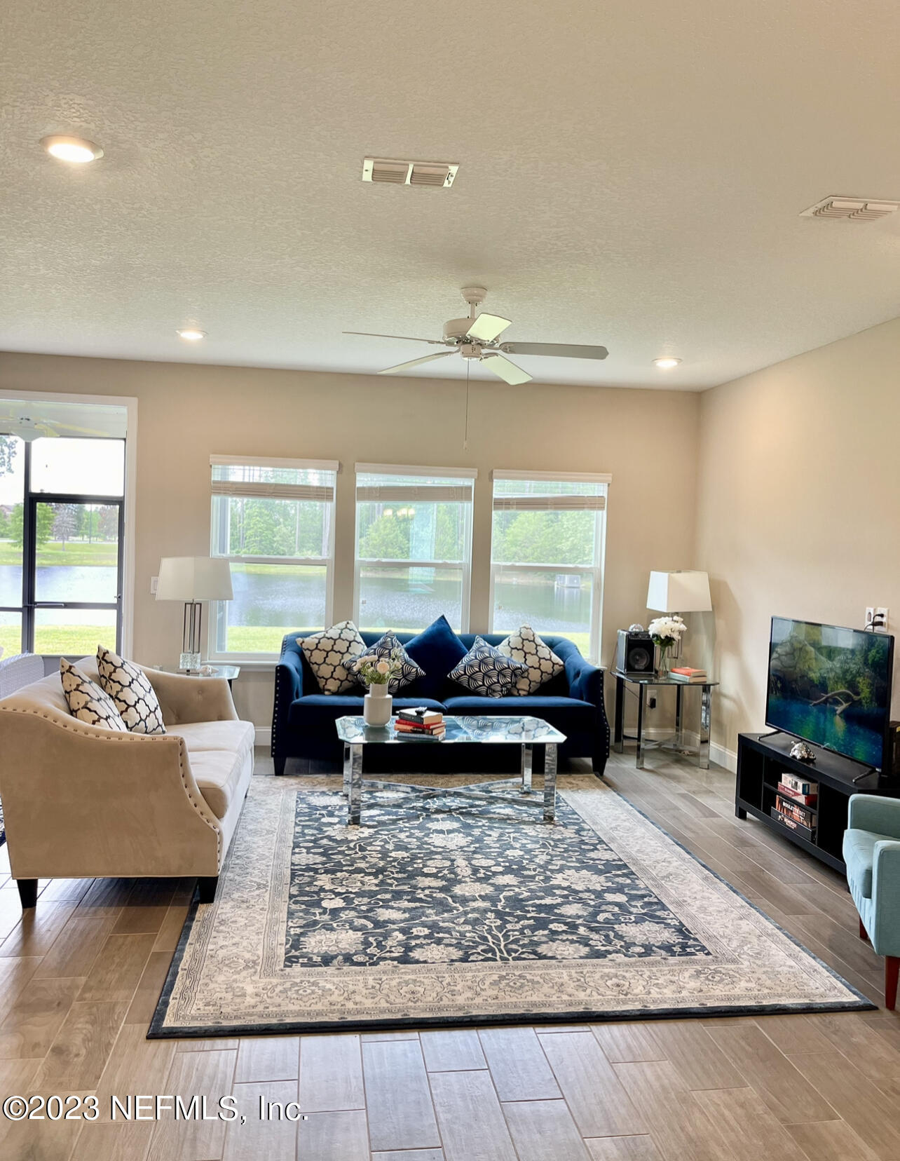 207 Silver Creek Place St. Augustine, FL 32095 - Photo 8 of 32 a living room with furniture and a large window
