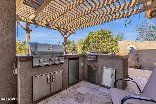 a kitchen with a stove and a microwave