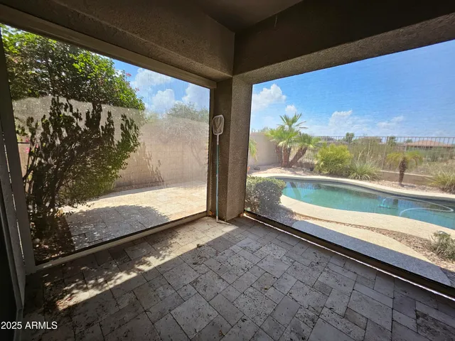 a view of back yard from a window