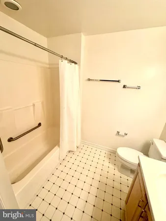 a bathroom with a sink and a shower