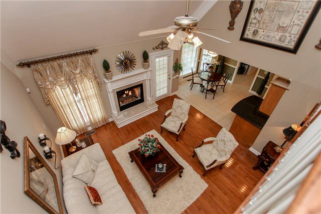 2465 Pleasant View Road Pleasant View, TN 37146 - Photo 13 of 20 The catwalk located above the living room allows for cathedral ceilings and more natural lighting below.