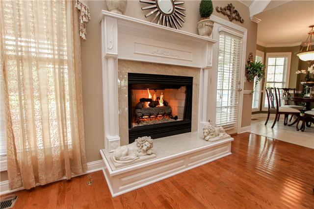 2465 Pleasant View Road Pleasant View, TN 37146 - Photo 8 of 20 For those cold nights, warm by the gas fireplace with custom made mantel and hearth