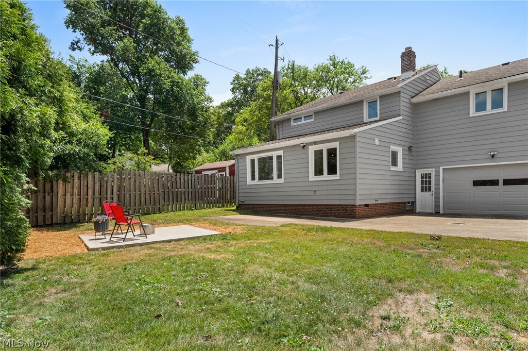 22625 Rye Road Shaker Heights, OH 44122 - Photo 37 of 38 Private backyard featuring a concrete patio, wood privacy fence, and mature trees
