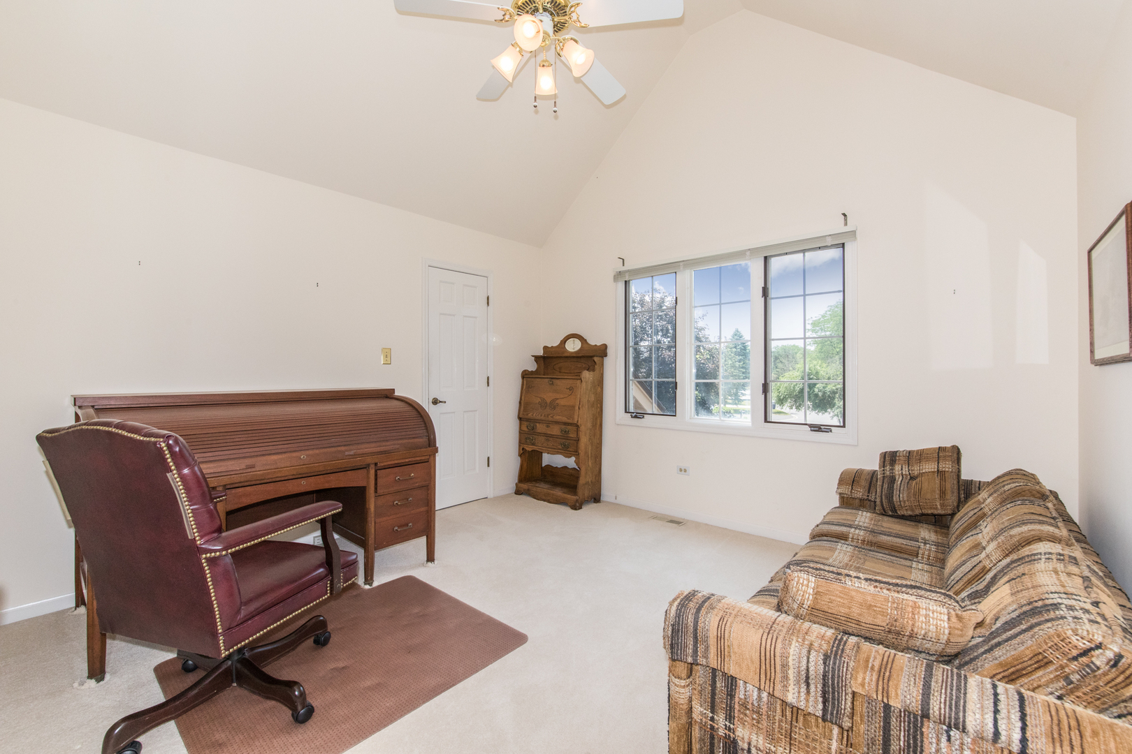 23W230 Hampton Circle Naperville, IL 60540 - Photo 28 of 55 a bedroom with furniture and a window