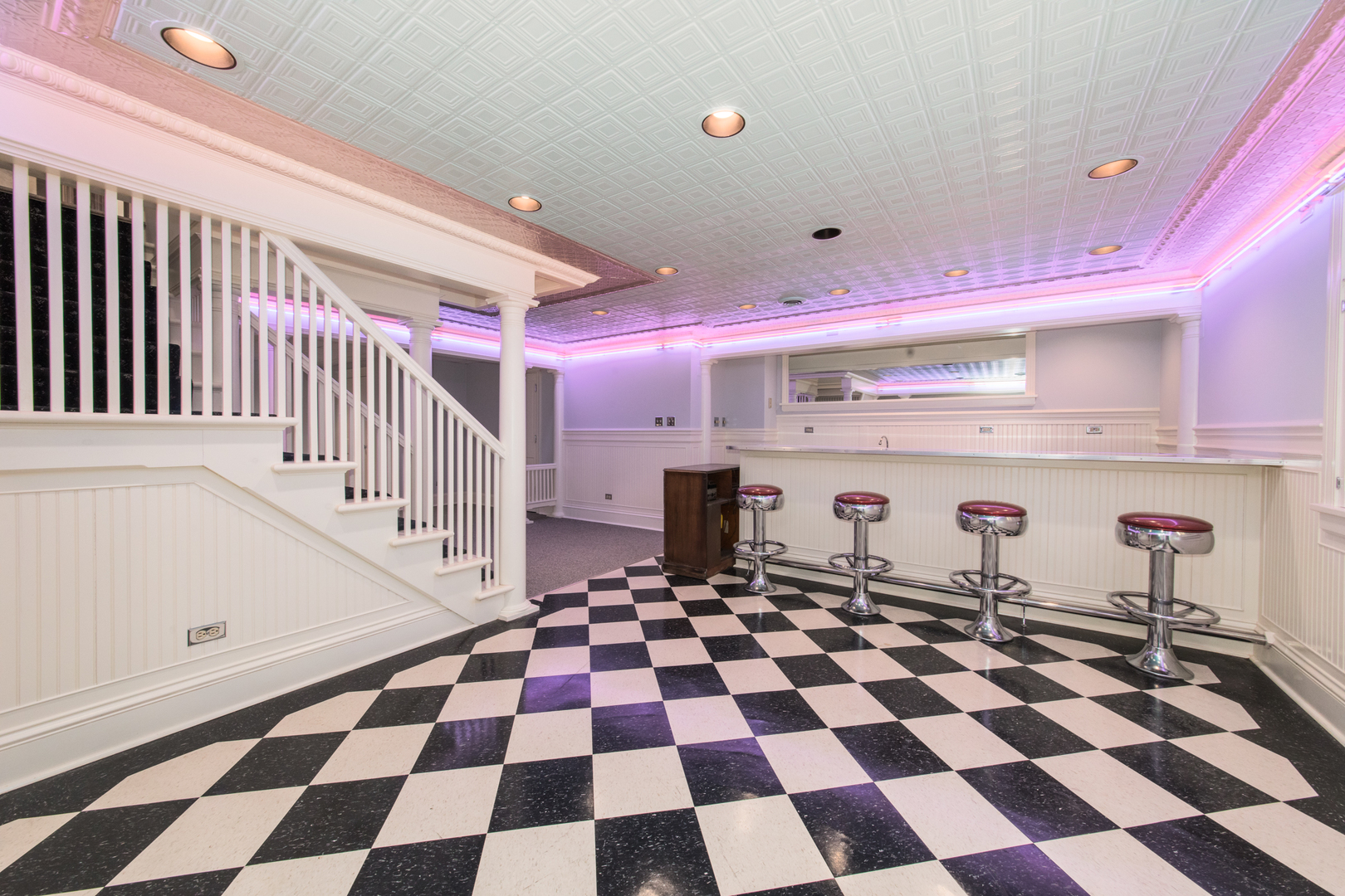 23W230 Hampton Circle Naperville, IL 60540 - Photo 35 of 55 a room with a black white checkered floor and a black white checkered floor