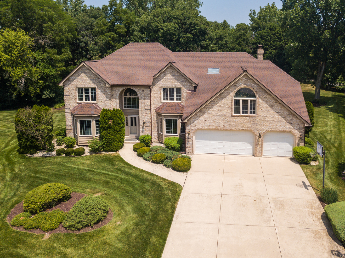23W230 Hampton Circle Naperville, IL 60540 - Photo 4 of 55 a aerial view of a house with yard and green space
