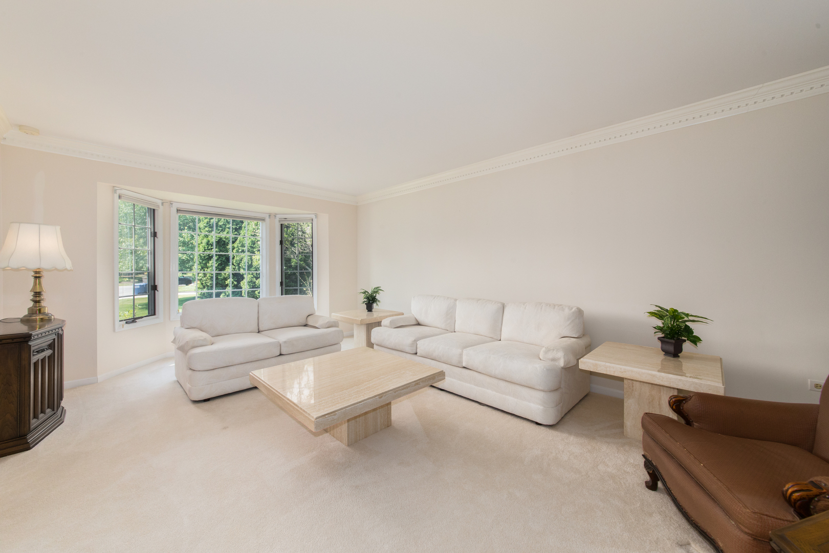 23W230 Hampton Circle Naperville, IL 60540 - Photo 7 of 55 a living room with furniture and a window