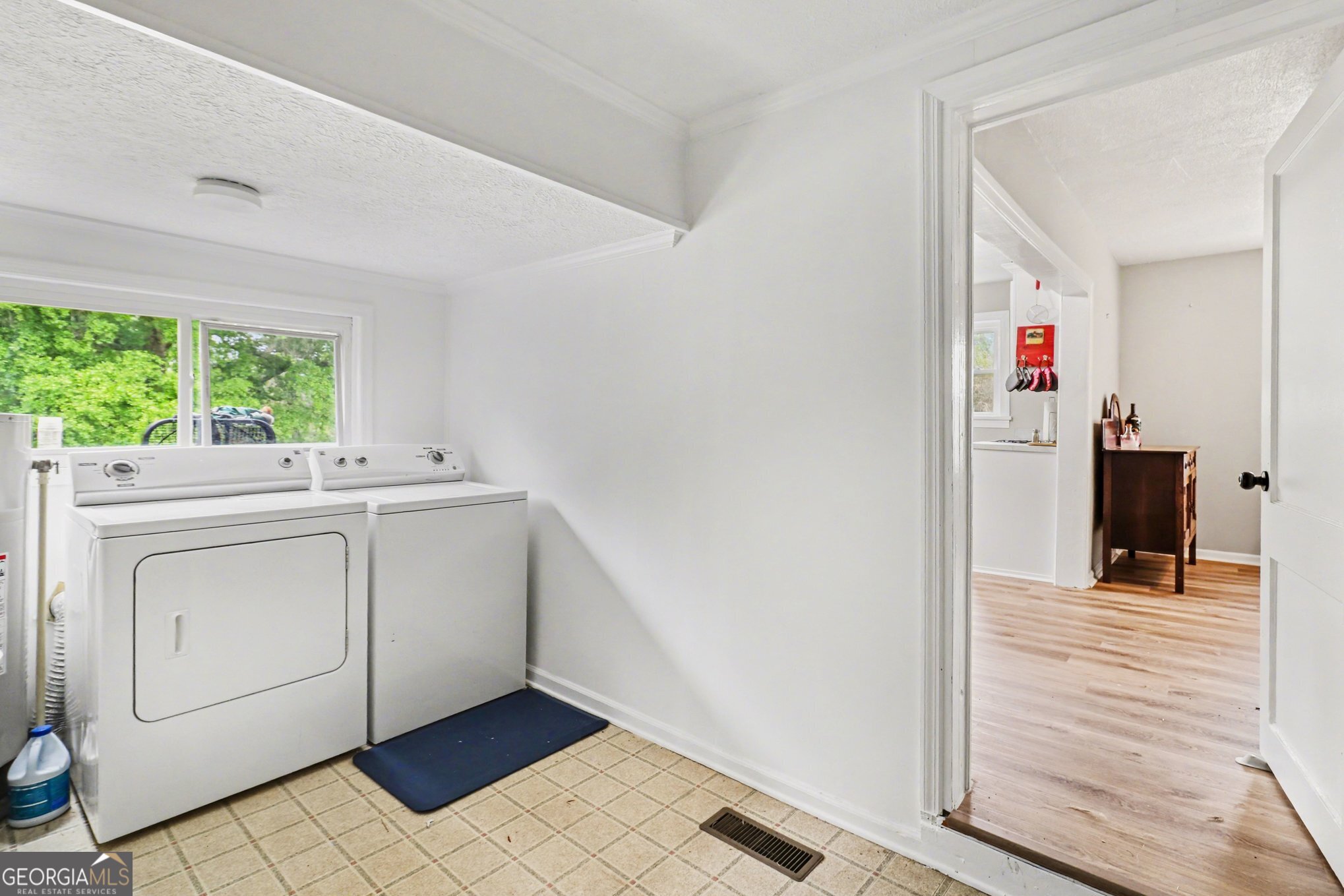 497 Corinth Road Hogansville, GA 30230 - Photo 20 of 37 a utility room with cabinets washer and dryer