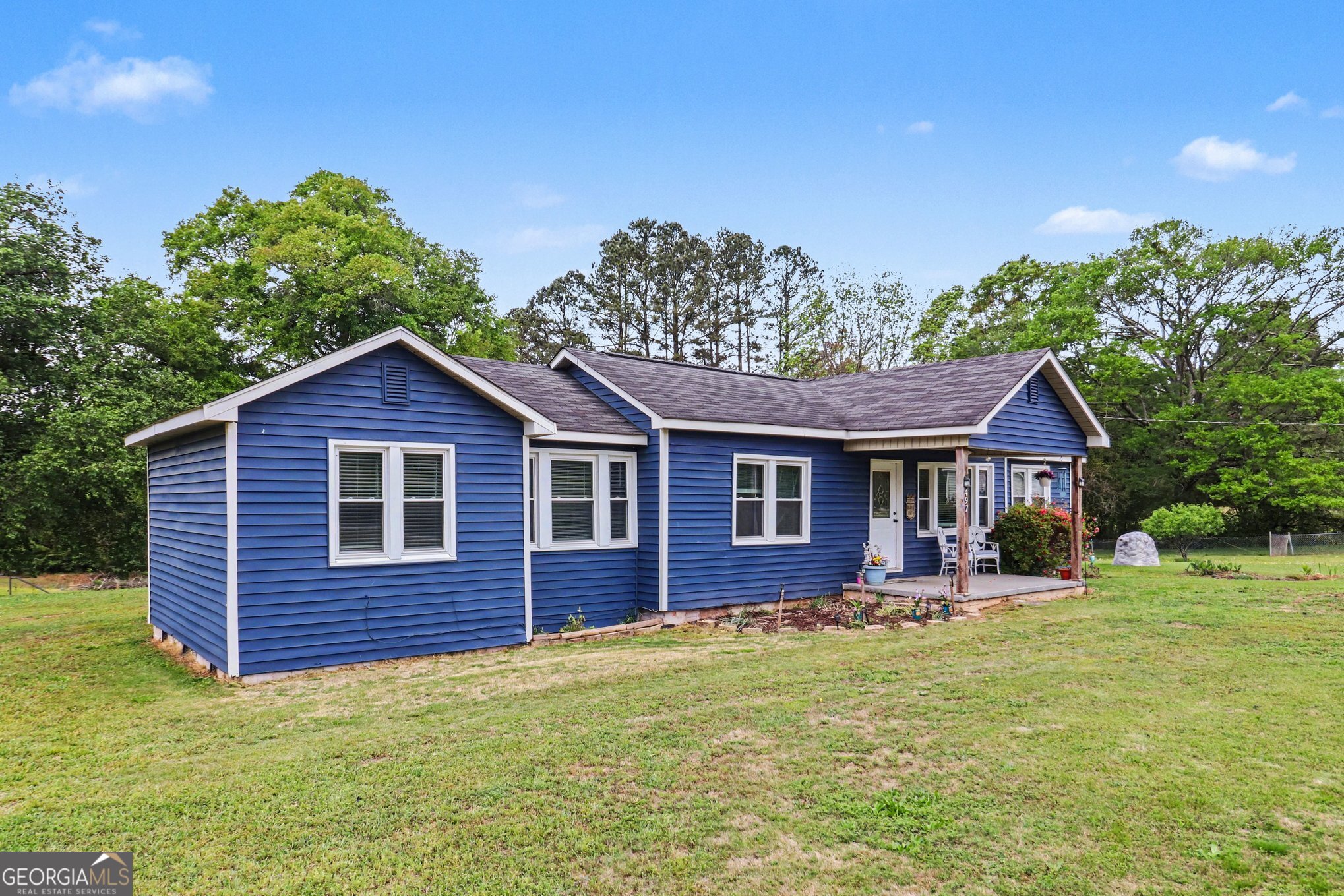 497 Corinth Road Hogansville, GA 30230 - Photo 3 of 37 a front view of a house with a yard