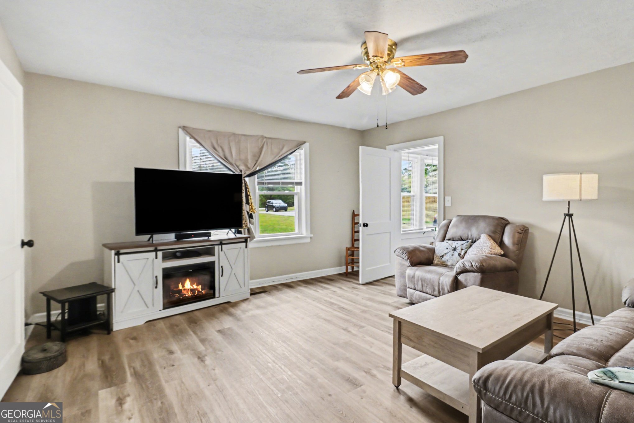 497 Corinth Road Hogansville, GA 30230 - Photo 5 of 37 a living room with furniture and a flat screen tv