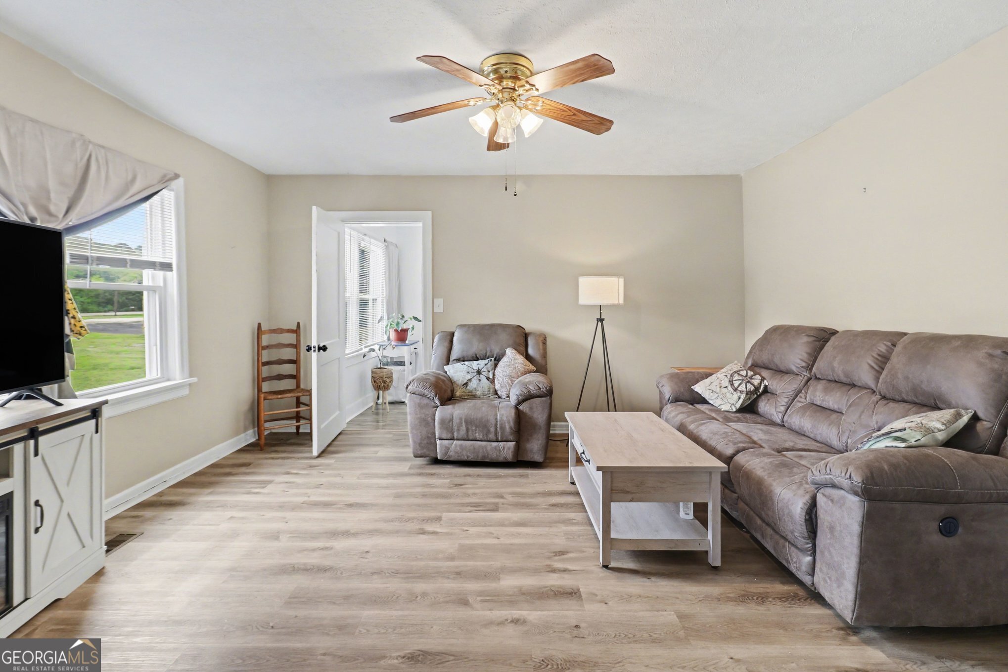 497 Corinth Road Hogansville, GA 30230 - Photo 6 of 37 a living room with furniture and a flat screen tv