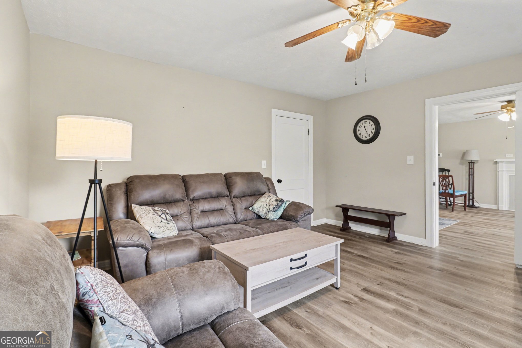 497 Corinth Road Hogansville, GA 30230 - Photo 7 of 37 a living room with furniture and a wooden floor