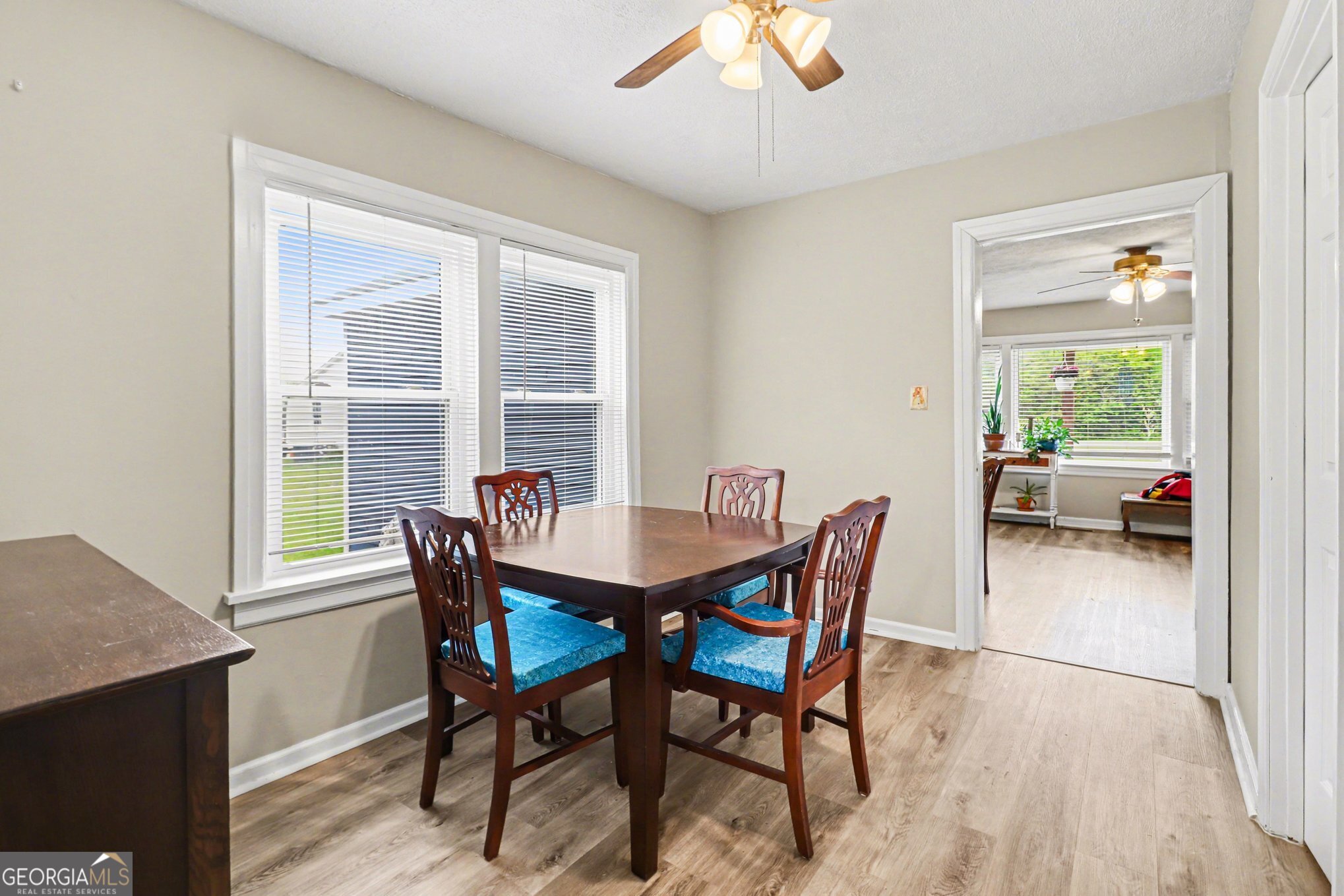 497 Corinth Road Hogansville, GA 30230 - Photo 9 of 37 a view of a dining room with furniture window and outside view