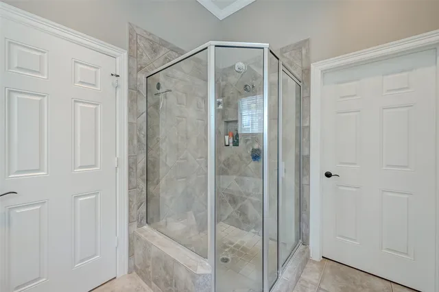 a view of a hallway with wooden floor and stairs