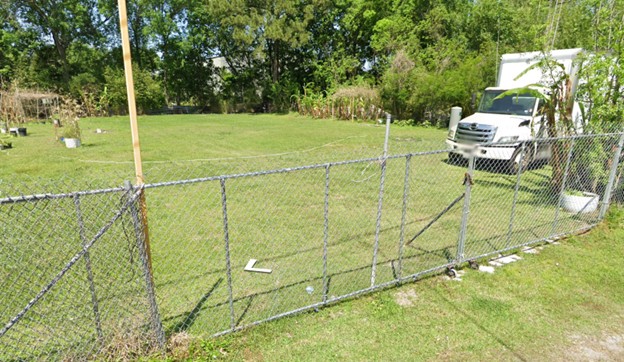 1825 Isom Street, Unit 5 Houston, TX 77039 - Photo 8 of 8 a view of a yard with a slide