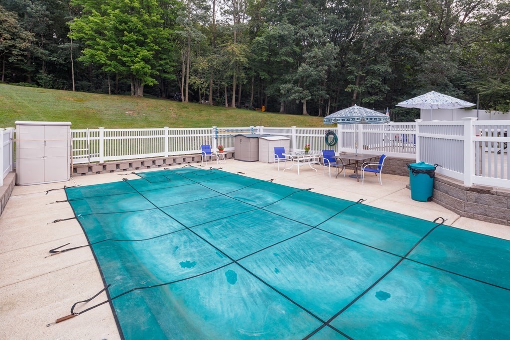 22 Stonehedge Circle Billerica, MA 01821 - Photo 19 of 30 a view of a terrace with chairs