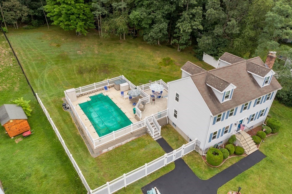 22 Stonehedge Circle Billerica, MA 01821 - Photo 20 of 30 an aerial view of a house with a ocean view