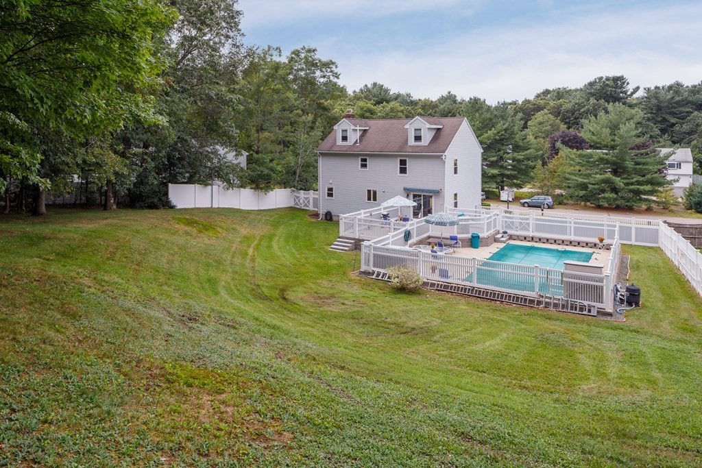 22 Stonehedge Circle Billerica, MA 01821 - Photo 23 of 30 a aerial view of a house with swimming pool garden and patio