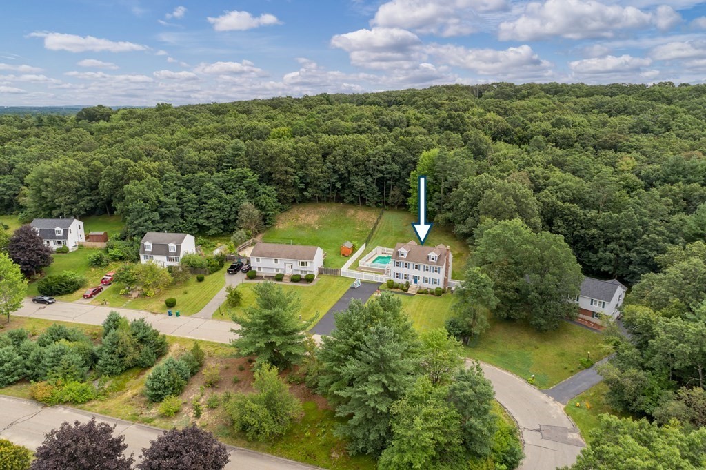 22 Stonehedge Circle Billerica, MA 01821 - Photo 28 of 30 an aerial view of residential house with outdoor space and swimming pool