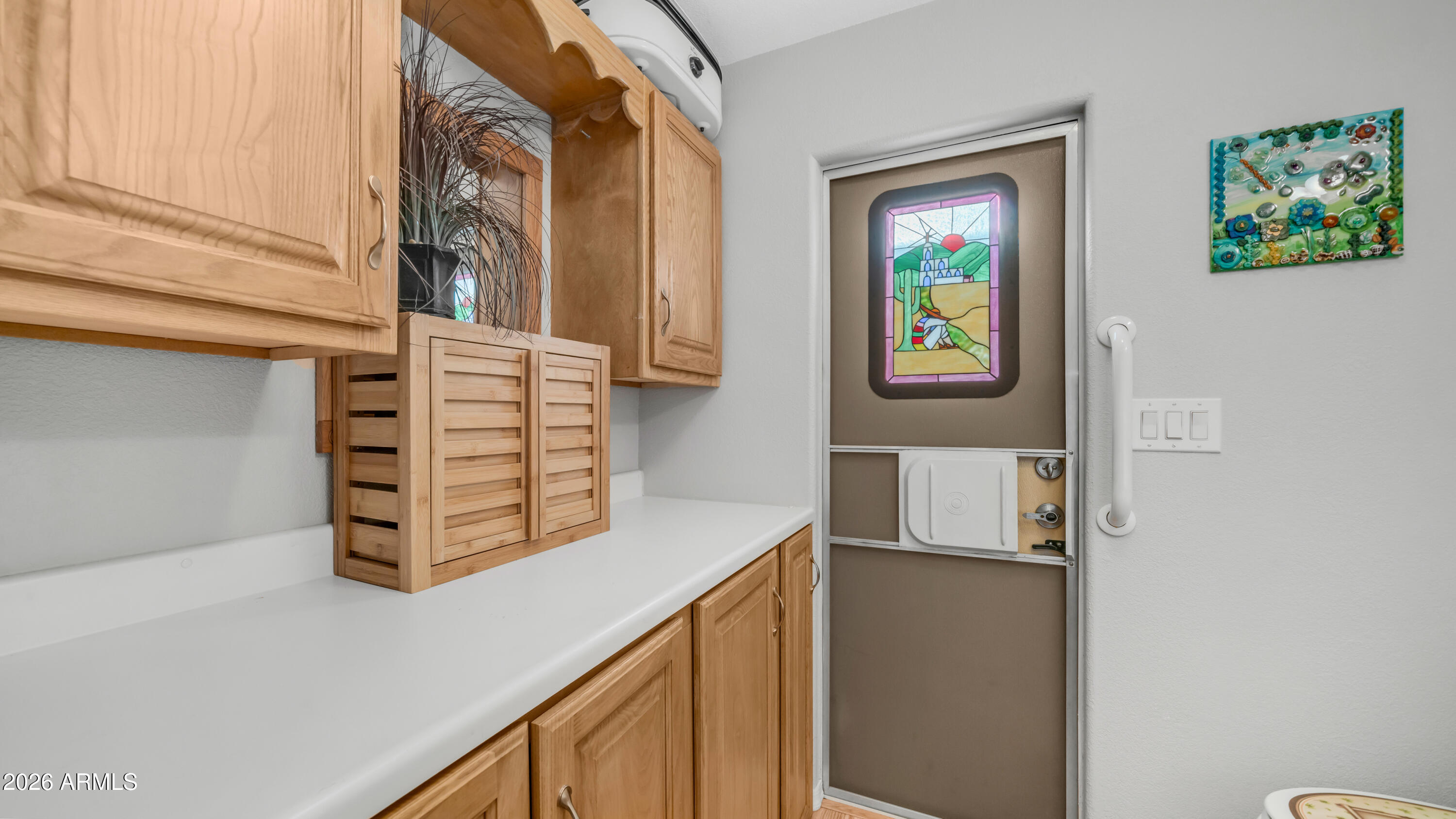 698 Felspar Drive, Unit 698 Apache Junction, AZ 85119 - Photo 25 of 62 a view of an entryway with wooden floor