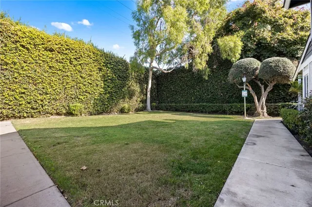 an aerial view of a house with a swimming pool