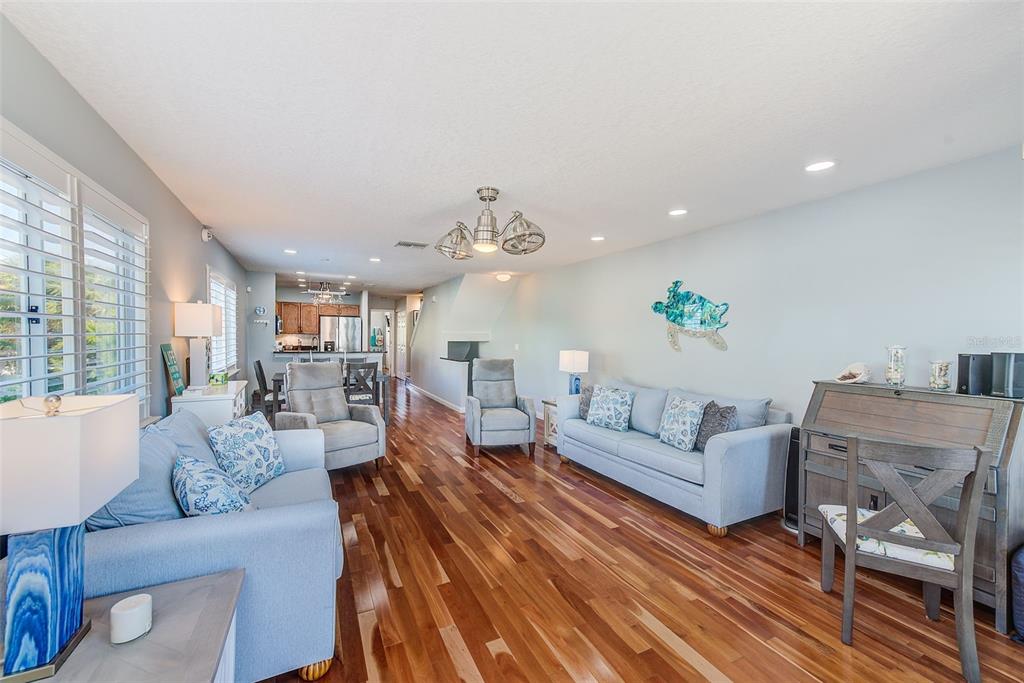 205 Marcdale Boulevard Indian Rocks Beach, FL 33785 - Photo 12 of 59 a living room with furniture and a large window