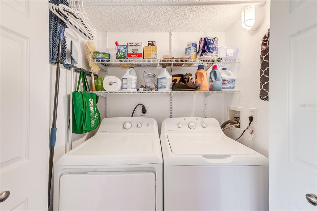 205 Marcdale Boulevard Indian Rocks Beach, FL 33785 - Photo 18 of 59 a utility room with dryer and washer