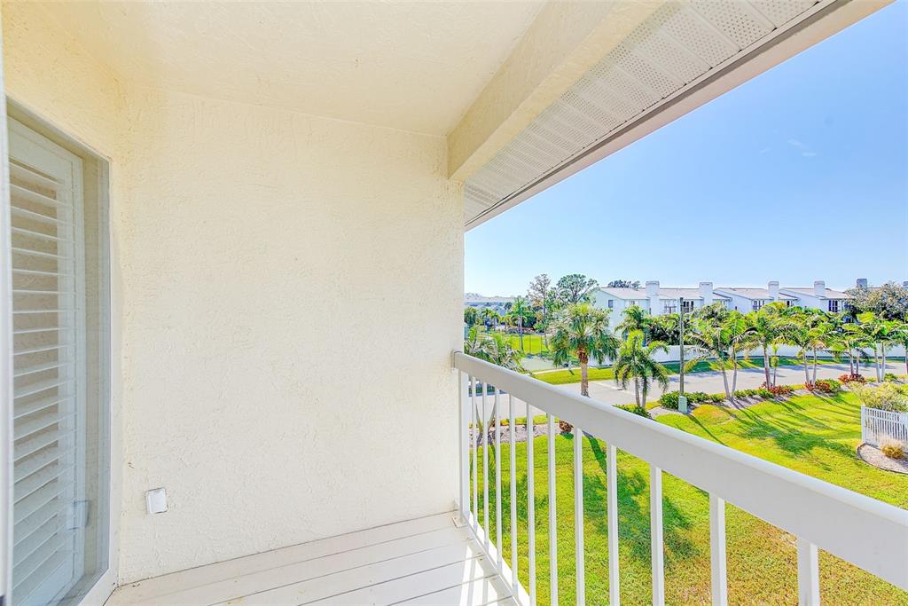 205 Marcdale Boulevard Indian Rocks Beach, FL 33785 - Photo 32 of 59 a city view from a balcony