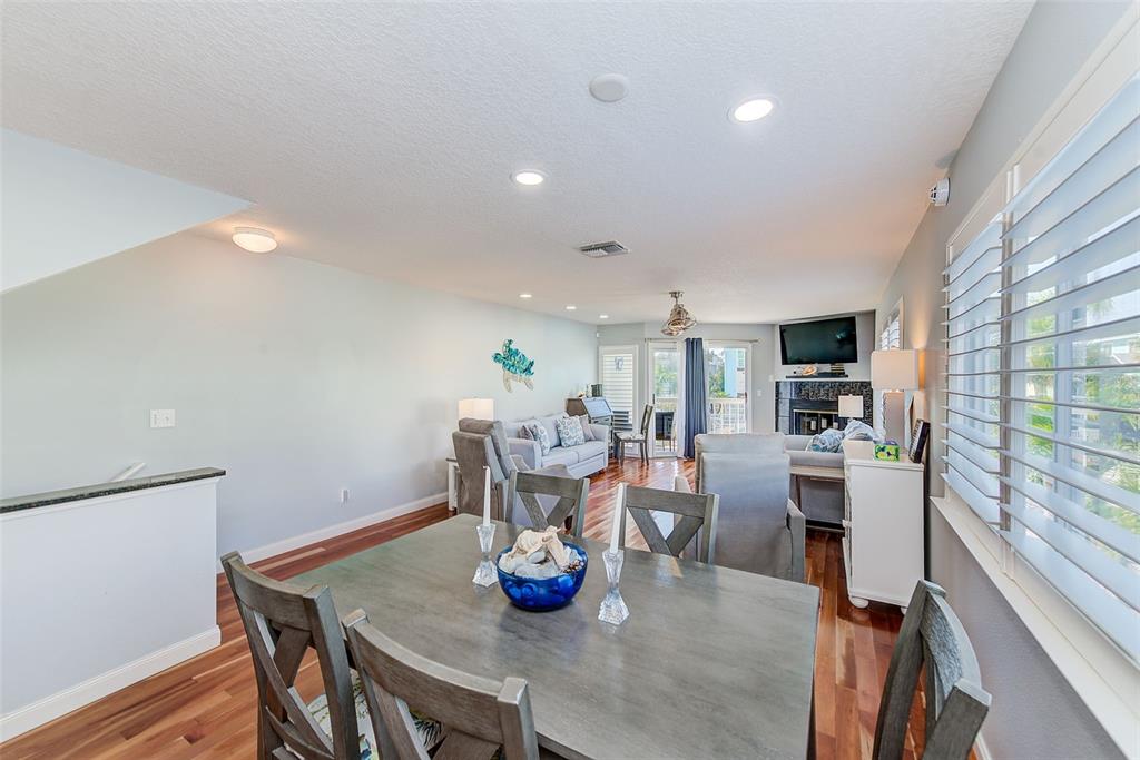 205 Marcdale Boulevard Indian Rocks Beach, FL 33785 - Photo 10 of 59 a view of a dining room with furniture window and outside view