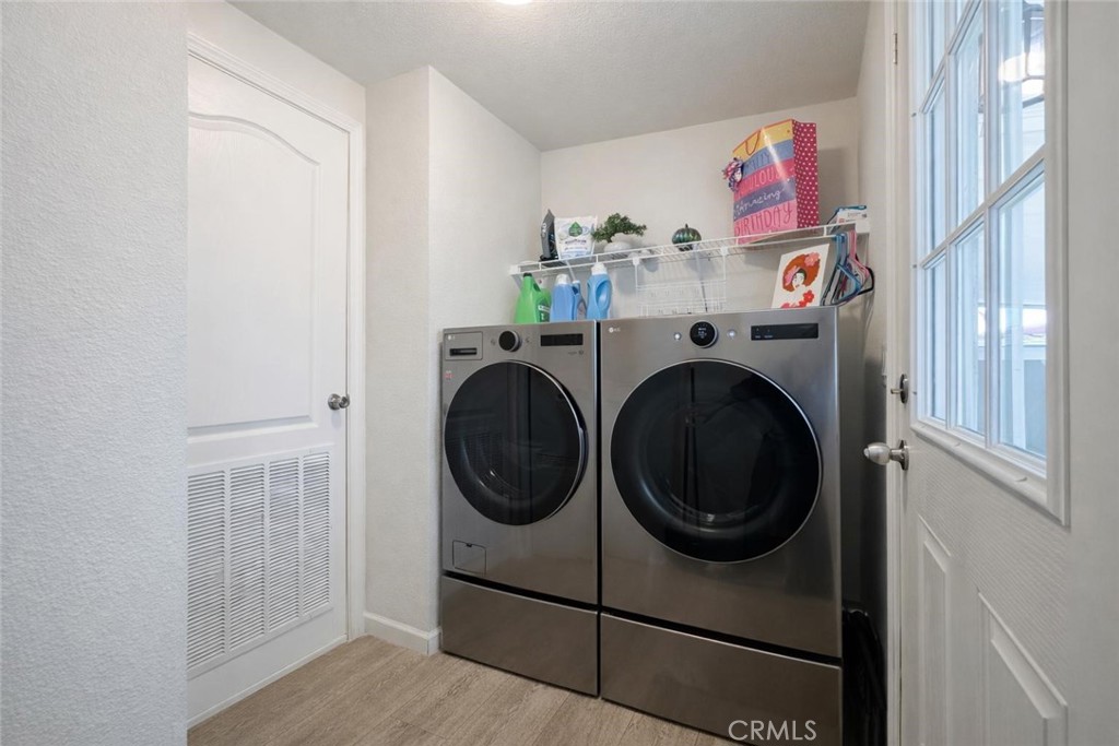 16600 Orange Avenue, Unit 130 Paramount, CA 90723 - Photo 19 of 31 a utility room with dryer and washer