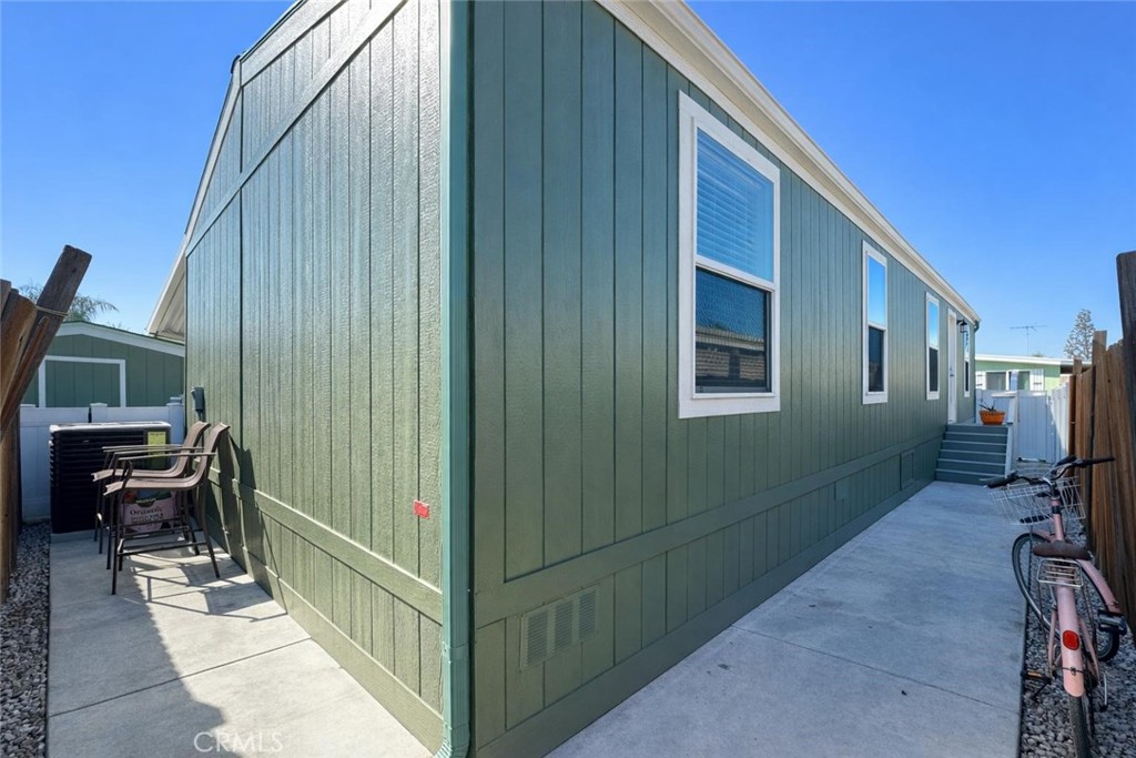 16600 Orange Avenue, Unit 130 Paramount, CA 90723 - Photo 22 of 31 a house view with a outdoor space