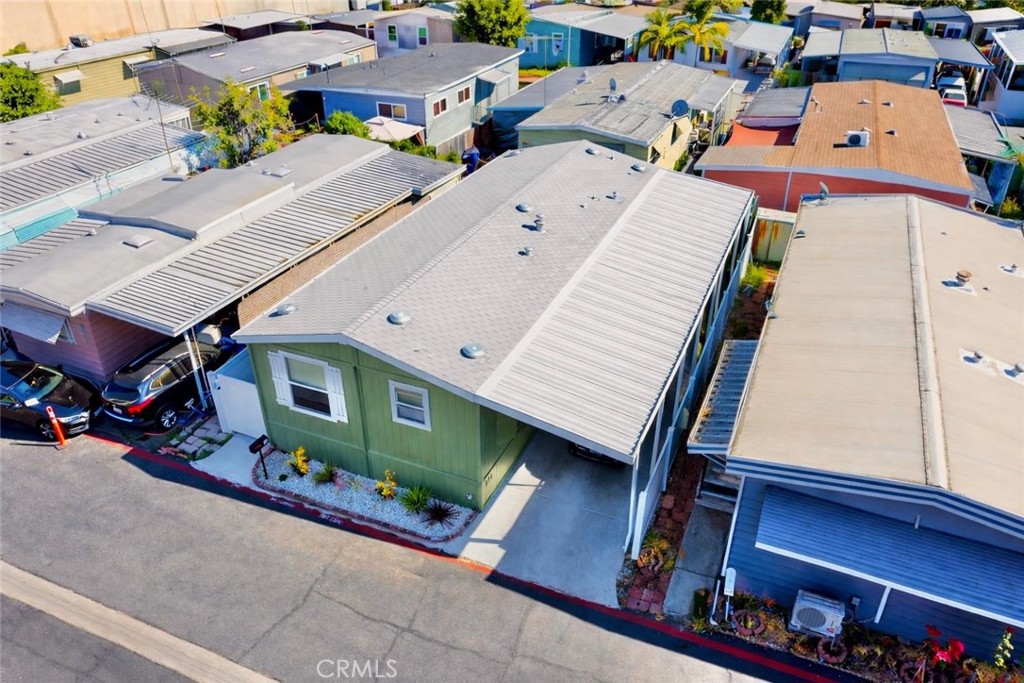 16600 Orange Avenue, Unit 130 Paramount, CA 90723 - Photo 31 of 31 an aerial view of a house with a street