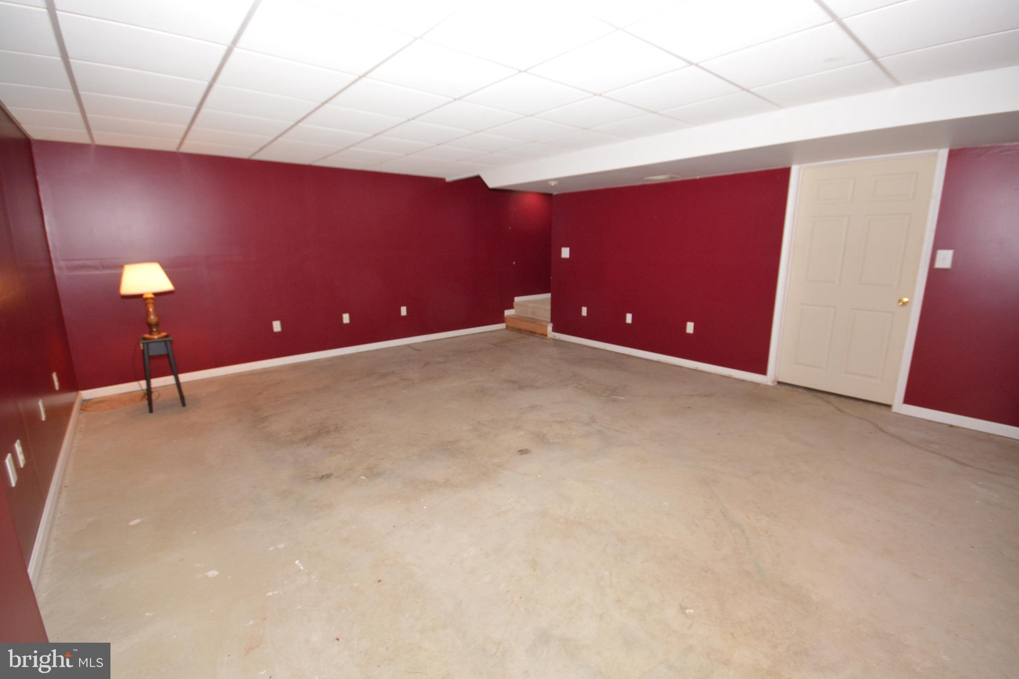 354 Crosswinds Drive Lititz, PA 17543 - Photo 25 of 26 LL Family Room w/Door to Utility Room