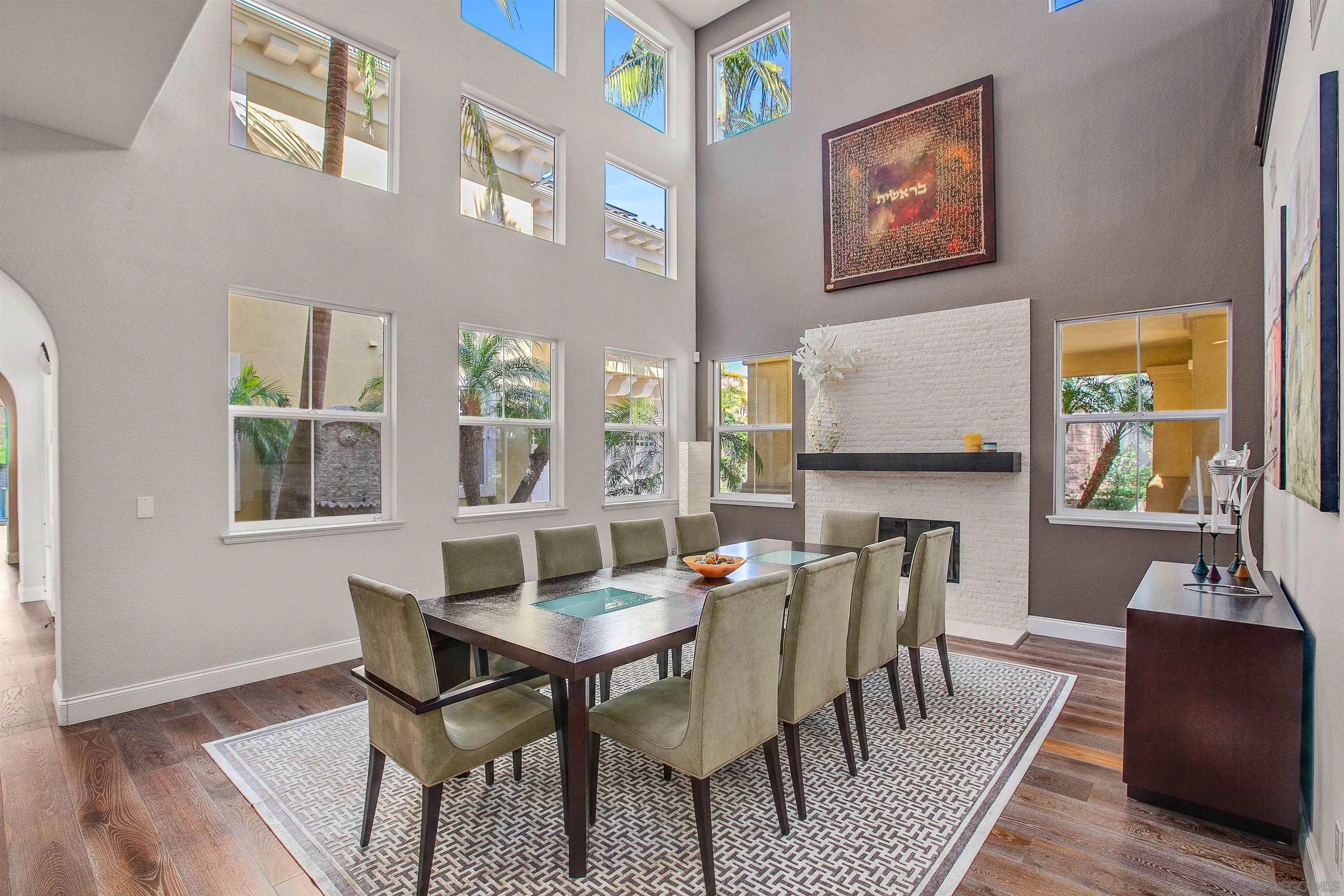 1460 Ravean Court Encinitas, CA 92024 - Photo 11 of 48 a view of a dining room with furniture and wooden floor