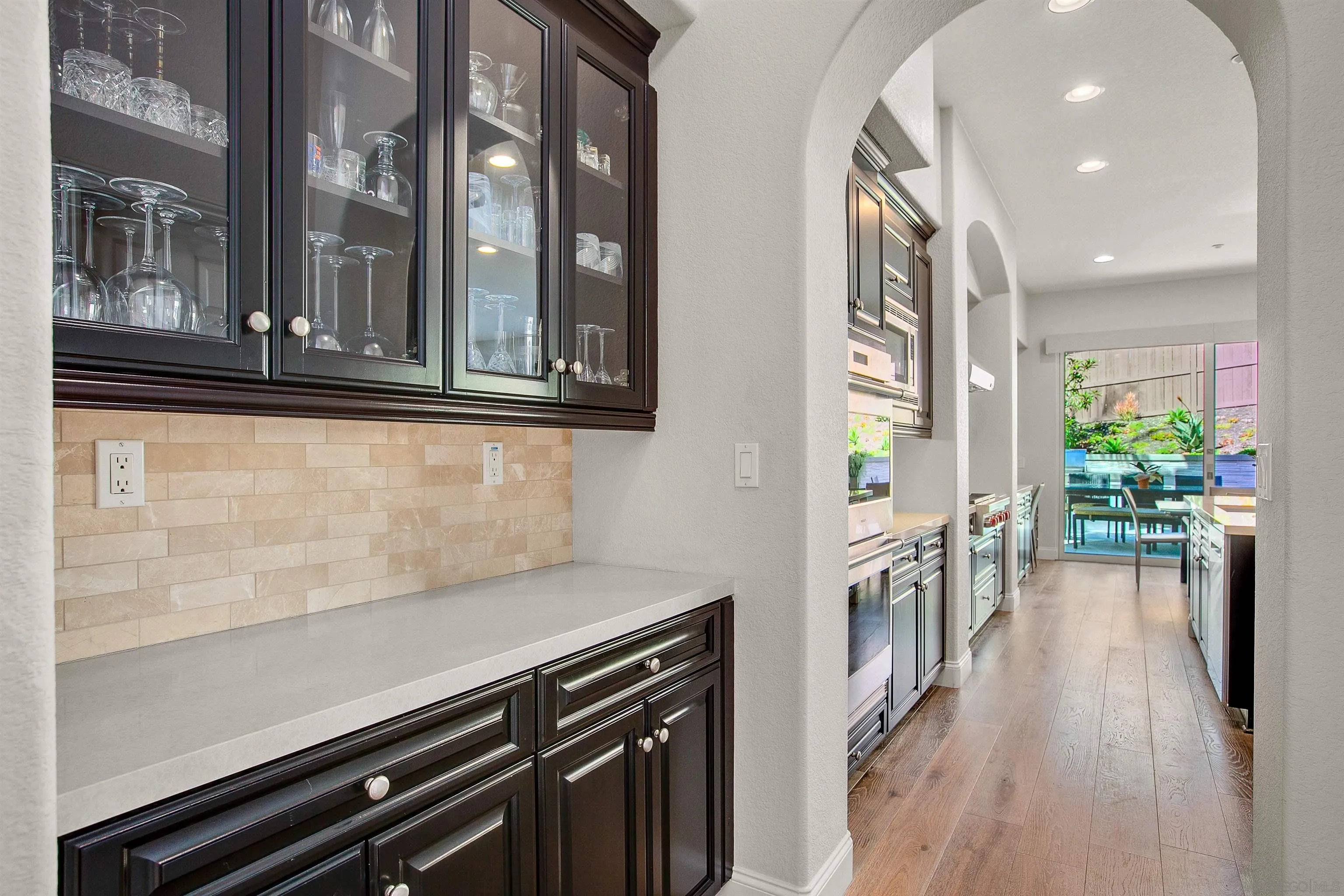 1460 Ravean Court Encinitas, CA 92024 - Photo 17 of 48 a view of a room with wooden floor and a window