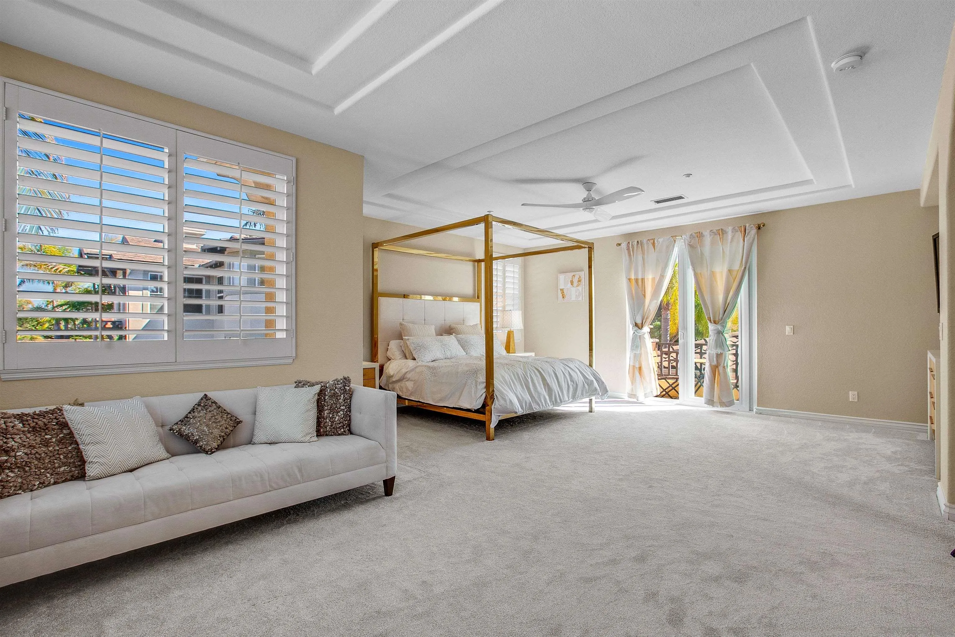 1460 Ravean Court Encinitas, CA 92024 - Photo 27 of 48 a living room with furniture and a large window