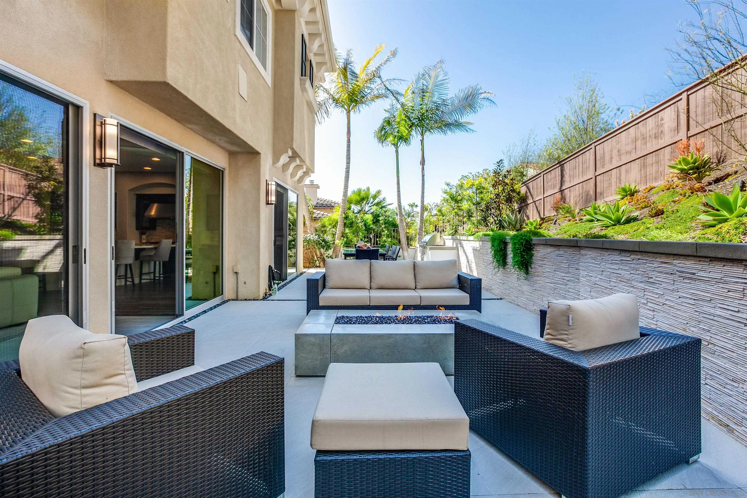 1460 Ravean Court Encinitas, CA 92024 - Photo 42 of 48 a living room with furniture and a potted plant