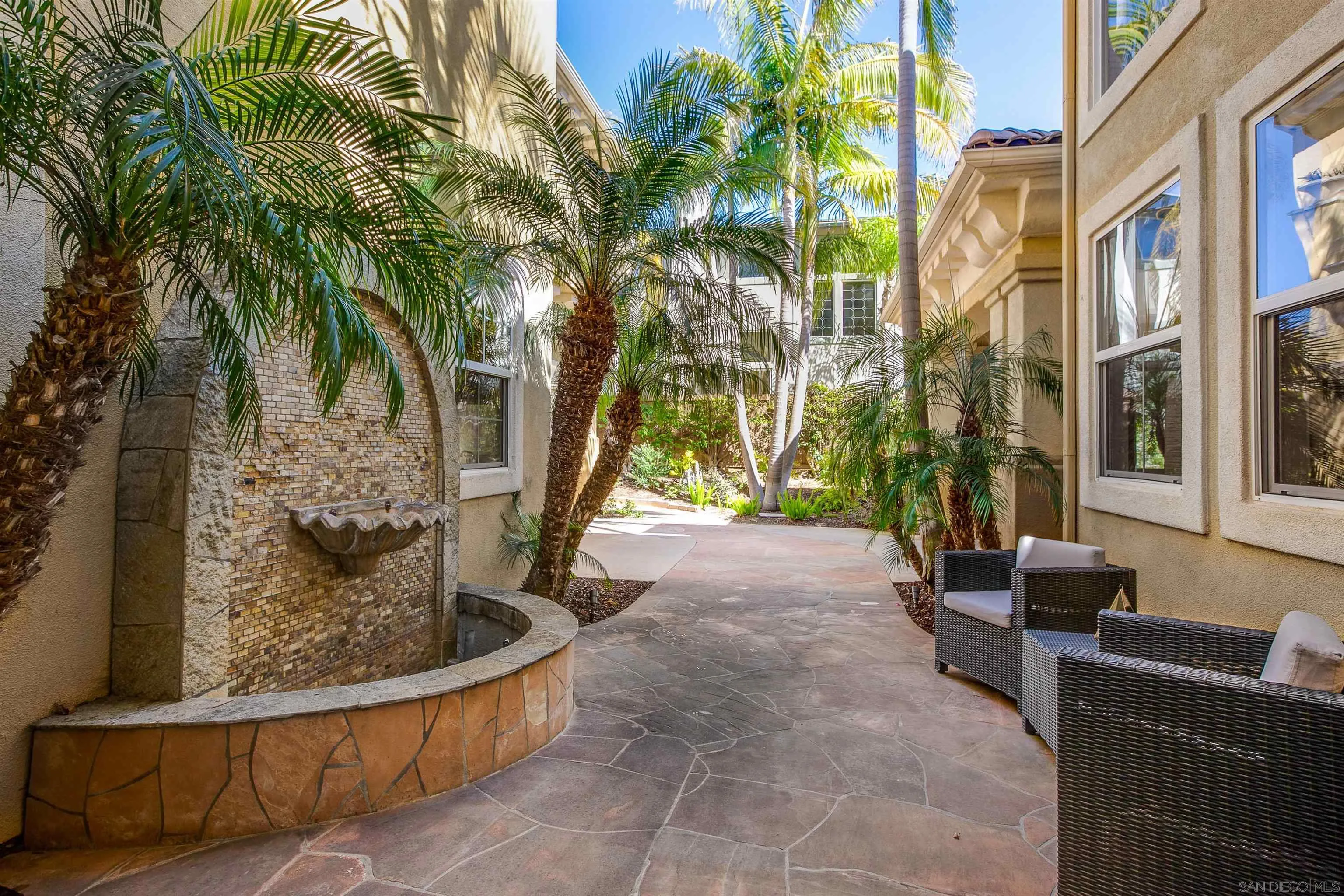 1460 Ravean Court Encinitas, CA 92024 - Photo 8 of 48 a view of a porch with a tree