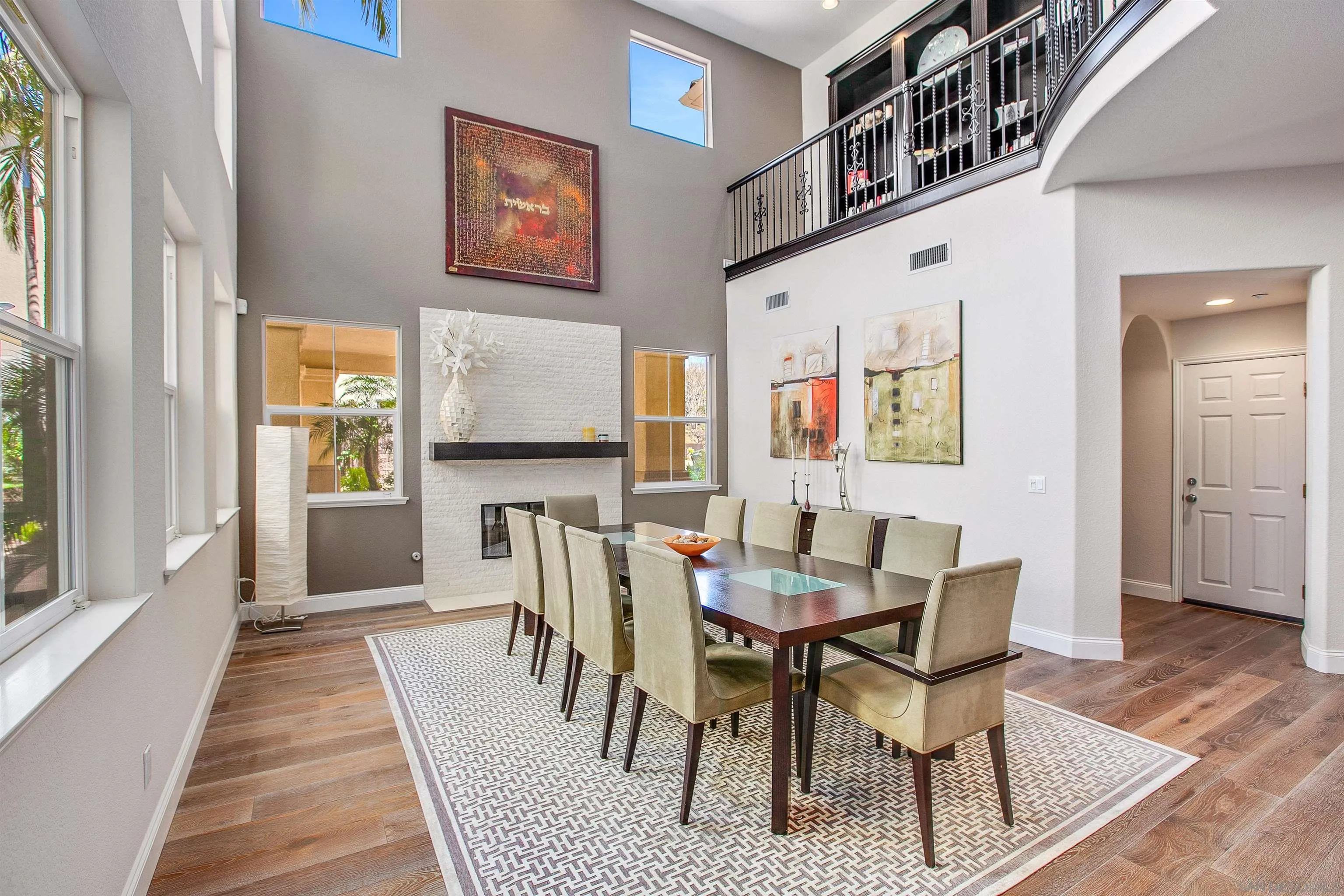 1460 Ravean Court Encinitas, CA 92024 - Photo 9 of 48 a view of a dining room with furniture and wooden floor