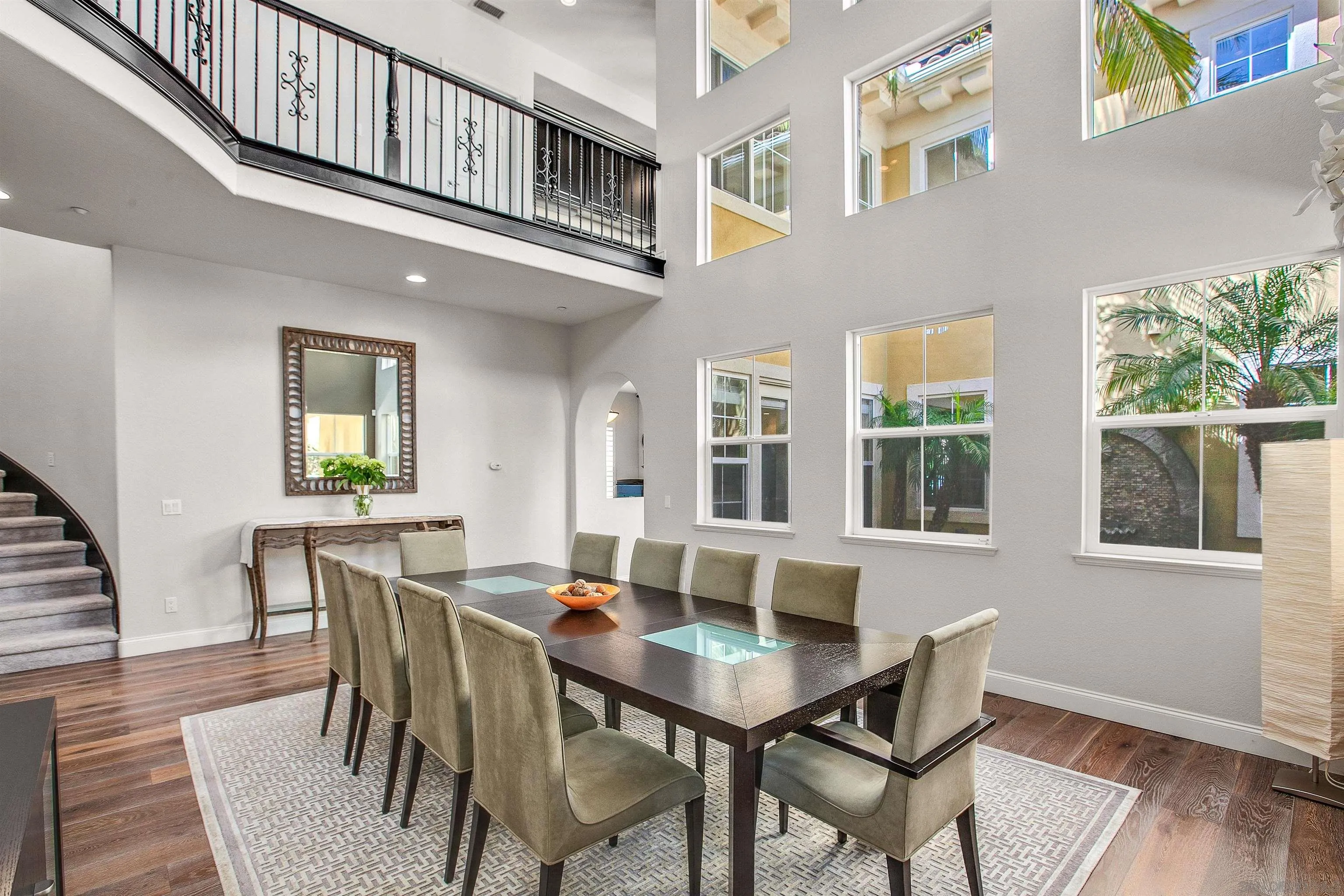 1460 Ravean Court Encinitas, CA 92024 - Photo 10 of 48 a view of a dining room with furniture window and wooden floor