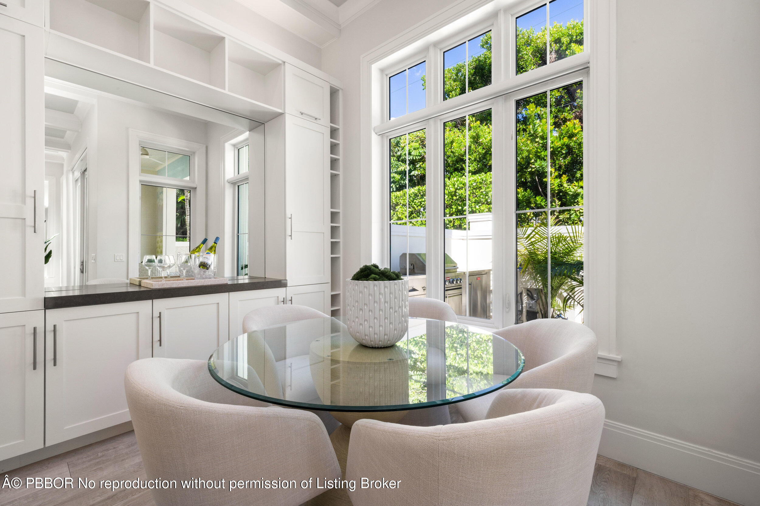 17 Adams Road, Unit 17 Ocean Ridge, FL 33435 - Photo 11 of 40 a view of a dining room with a table and chair