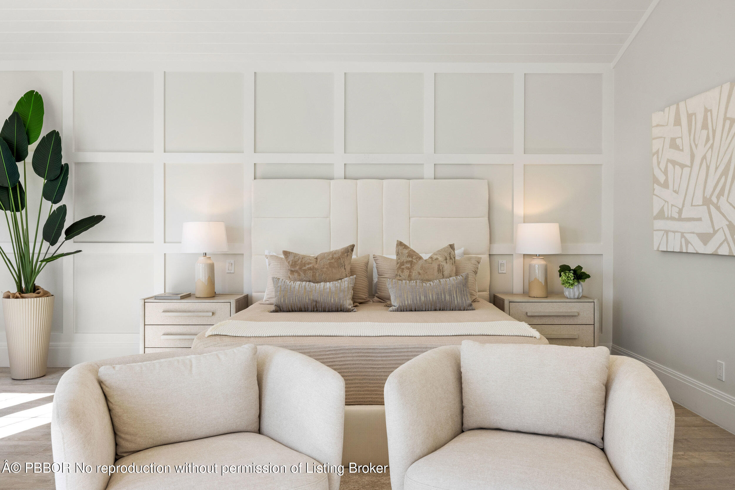 17 Adams Road, Unit 17 Ocean Ridge, FL 33435 - Photo 15 of 40 a living room with furniture a potted plant and a lamp