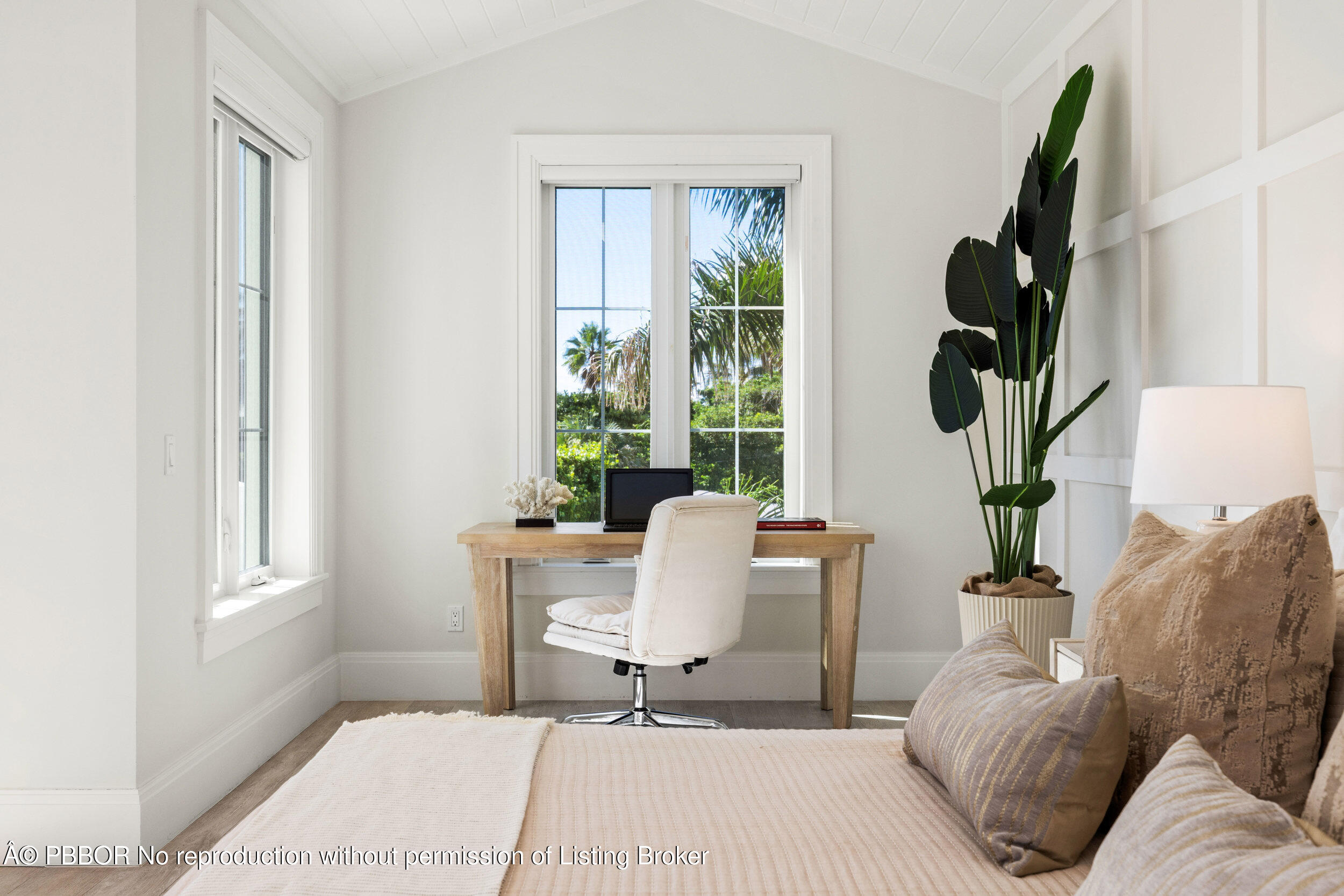 17 Adams Road, Unit 17 Ocean Ridge, FL 33435 - Photo 16 of 40 a living room with furniture a window and a potted plant