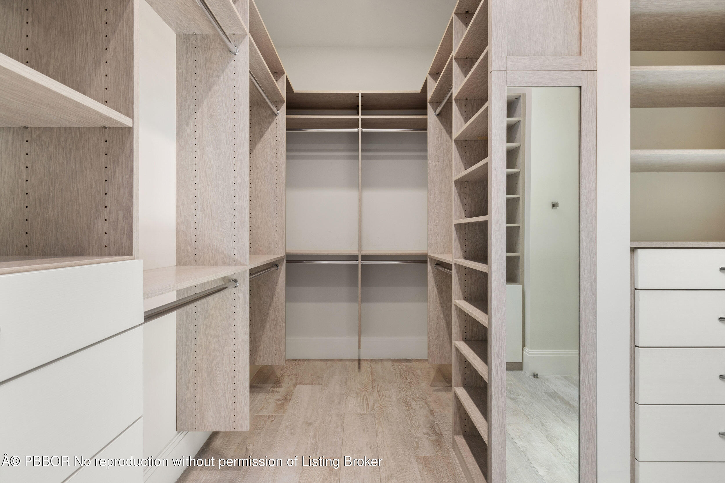 17 Adams Road, Unit 17 Ocean Ridge, FL 33435 - Photo 20 of 40 a view of walk in closet with empty racks