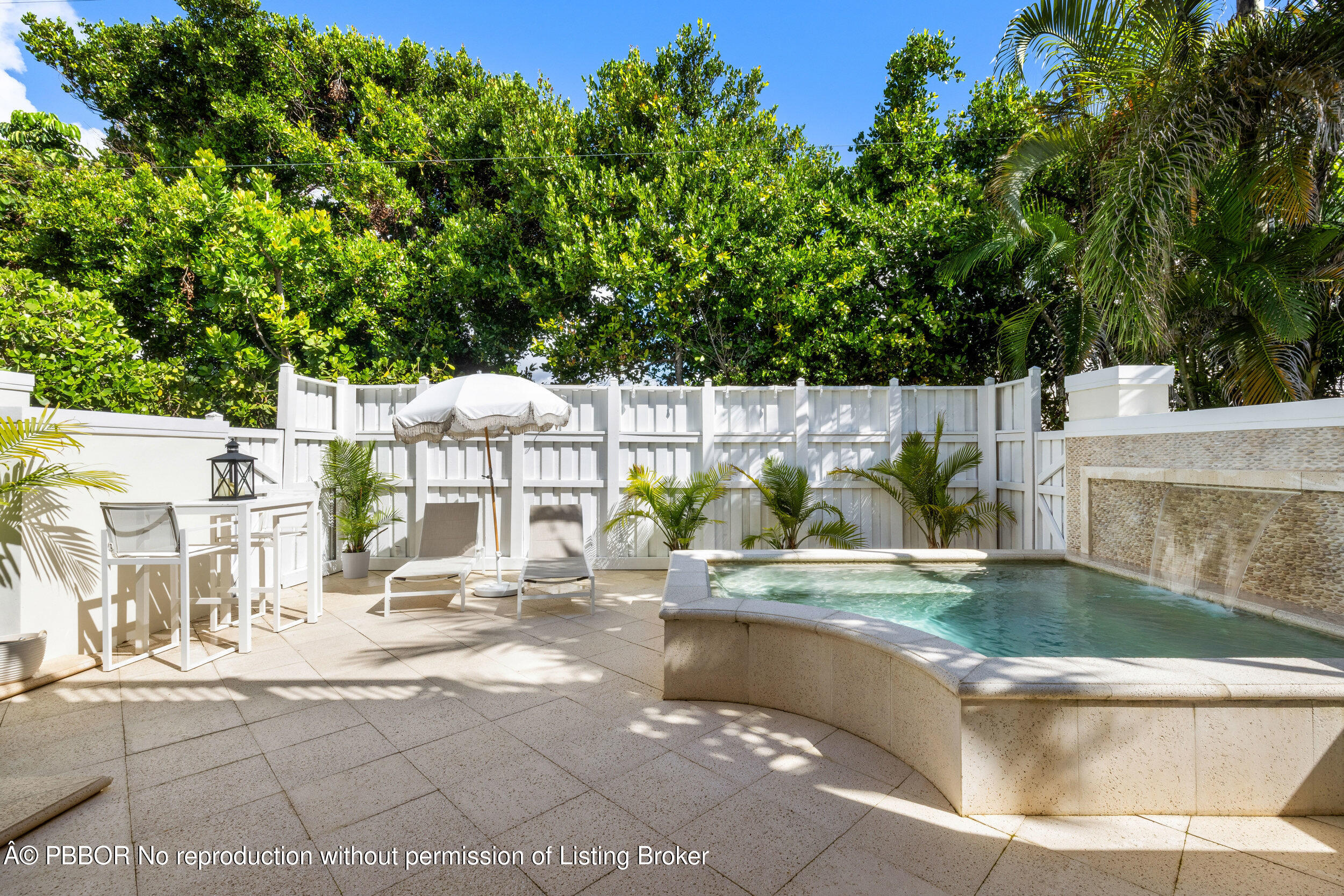 17 Adams Road, Unit 17 Ocean Ridge, FL 33435 - Photo 27 of 40 a view of a swimming pool with a patio