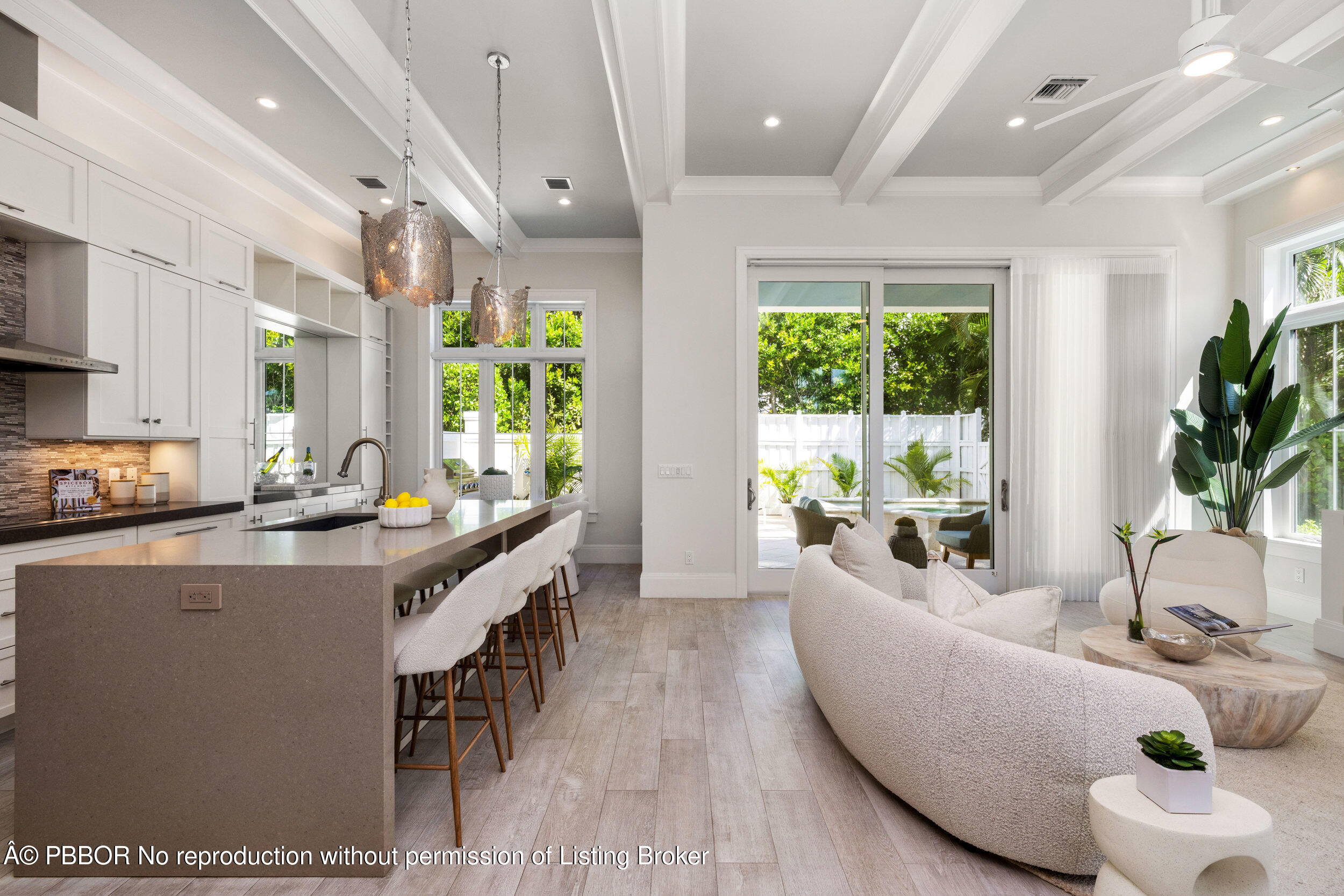 17 Adams Road, Unit 17 Ocean Ridge, FL 33435 - Photo 6 of 40 a living room with furniture and a large window