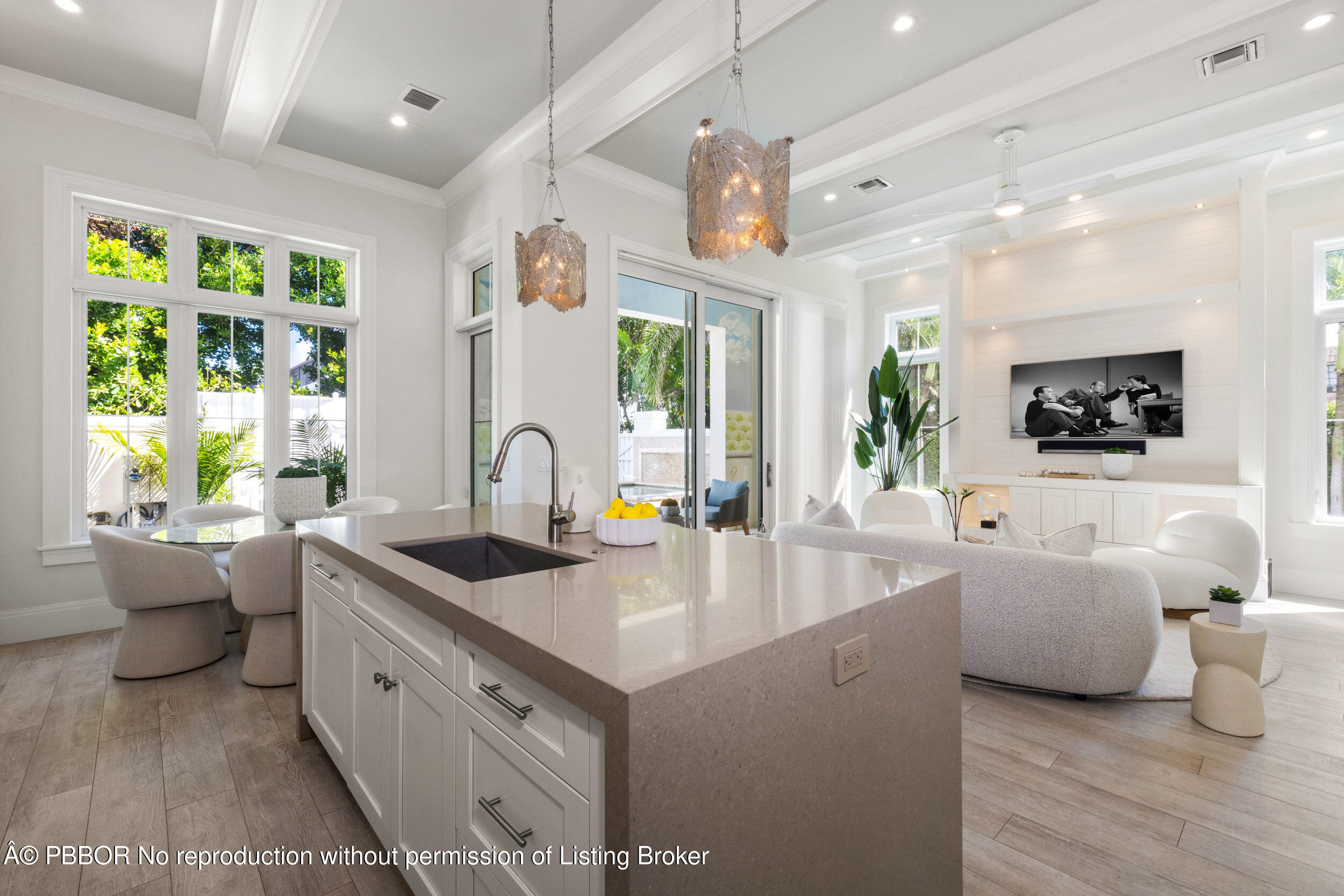 17 Adams Road, Unit 17 Ocean Ridge, FL 33435 - Photo 9 of 40 a large white kitchen with a large window