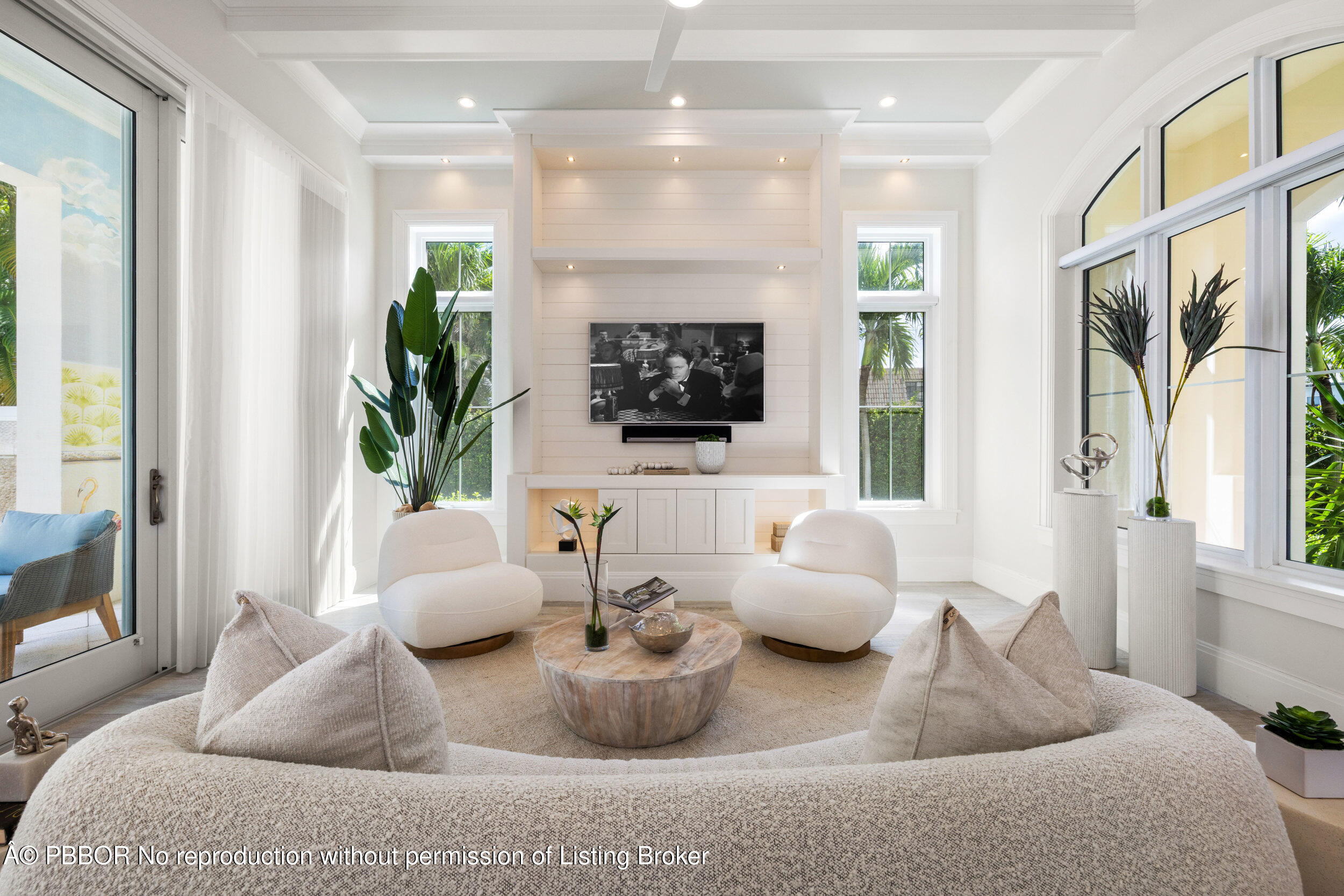 17 Adams Road, Unit 17 Ocean Ridge, FL 33435 - Photo 10 of 40 a living room with furniture and a flat screen tv