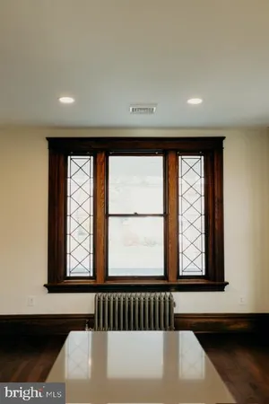 a view of a hallway with windows
